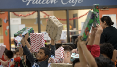 W.B. Travis students get Christmas gifts amid potential school closure