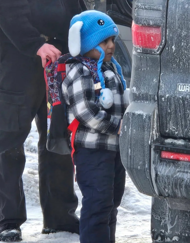 A photo showing 5-year-old Liam Ramos being detained by a federal immigration agent in Minnesota.