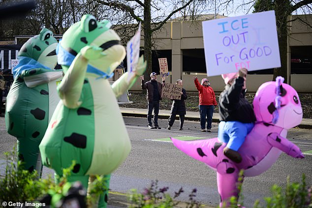 There appeared to be a sense of humor in Portland, Oregon as activists help signs during a protest near Legacy Emanuel Hospital
