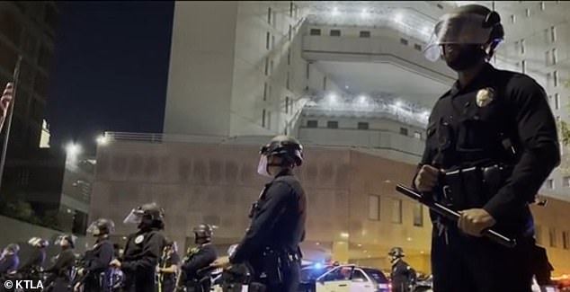 Police in riot gear could be seen waiting to deal with any conflicts