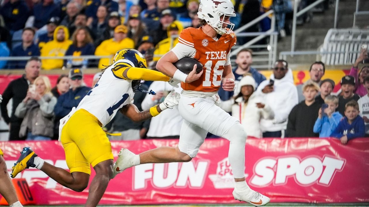 Arch Manning runs and passes Texas past Michigan in Citrus Bowl