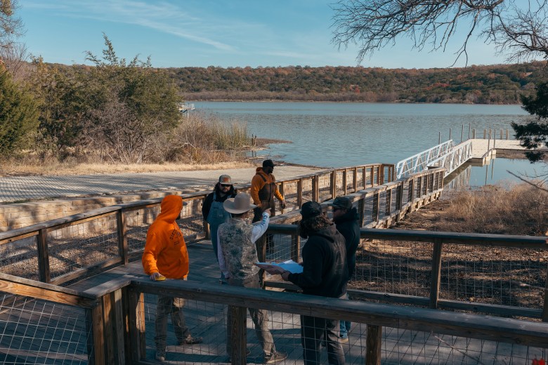 A crew takes measurements of the boardwalk that leads to Tucker Lake at Palo Pinto Mountains State Park on Monday, Dec. 15, 2025.