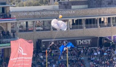 Parachutist takes nasty fall at Fort Worth football game