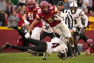 Iowa State wide receiver Jayden Higgins (9) is tackled by Texas Tech defensive back Maurion...