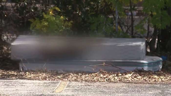 Woman fears heavily stained mattress dumped in empty North Side lot could be connected to crime