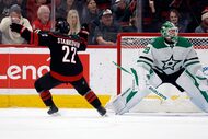 Carolina Hurricanes' Logan Stankoven (22) scores a goal against Dallas Stars' Jake Oettinger...