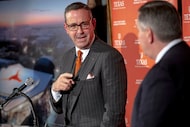 University of Texas athletics director Chris Del Conte points to Oak View Group CEO Tim...