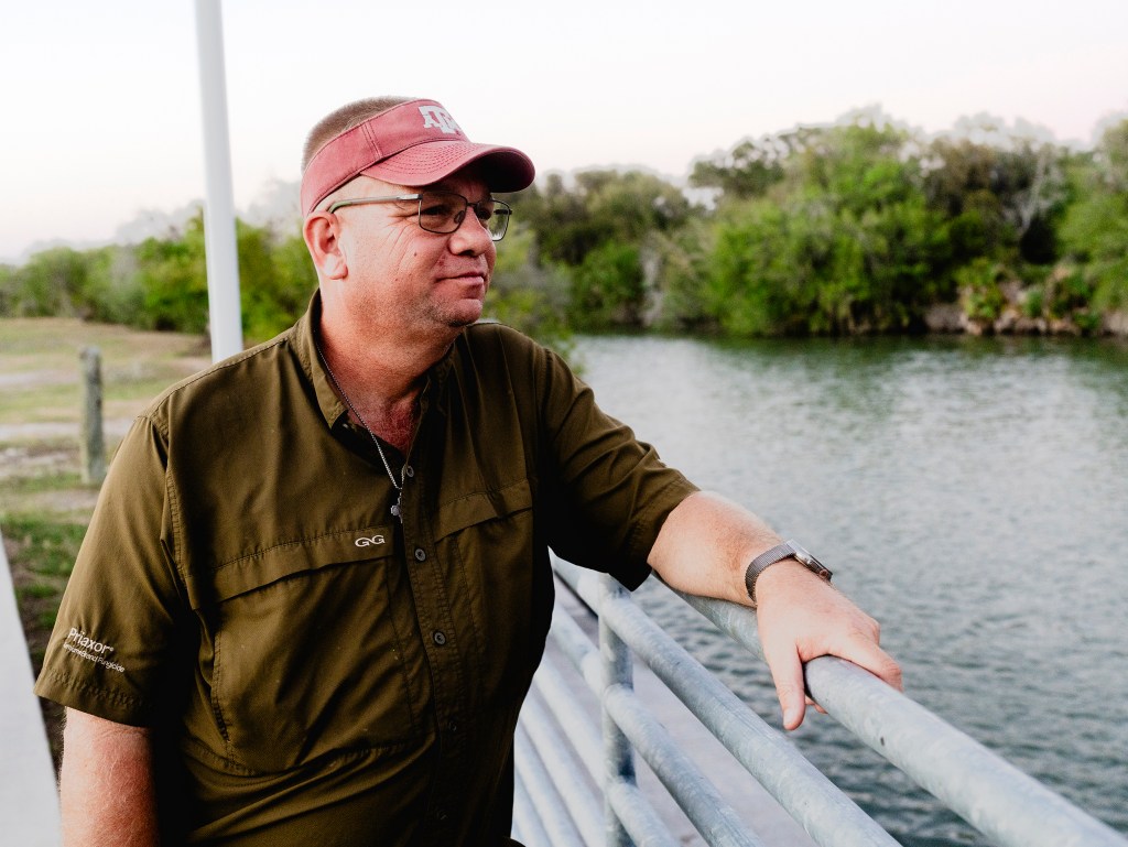 Kelly Harlan looks at the Nueces River from Hazel Bazemore -Calallen Park on Oct. 20, 2025.