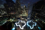 A pool in the shape of Texas is illuminated at the Marriott Marquis Houston, the NFL...