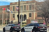 Dozens of Dallas police officers investigate a situation at North Dallas High School in...