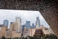 Raindrops cling to the windows of Dallas City Hall in downtown Dallas, September 3, 2024....