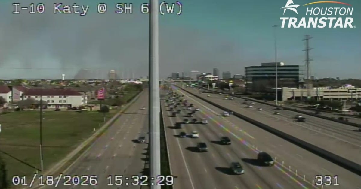 Crews managing grass fire at west Houston reservoir