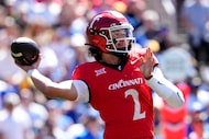 Cincinnati quarterback Brendan Sorsby throws a pass during the first half of an NCAA college...
