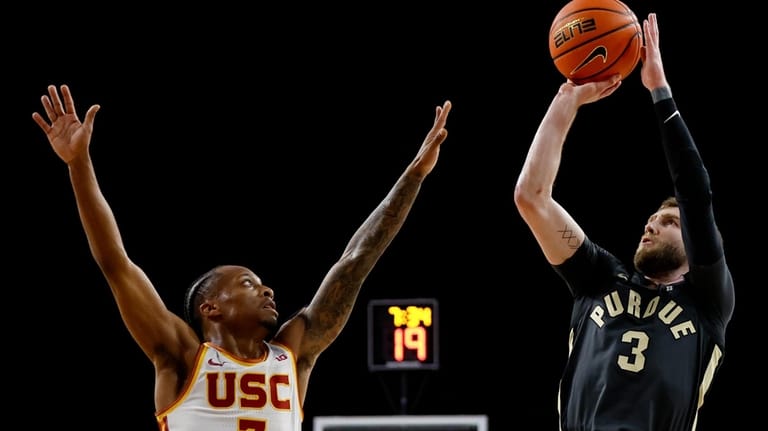 Purdue guard Braden Smith (3) drives to the basket with...