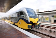 The new DART Silver Line makes its way to Addison Station for a ribbon cutting to mark its...