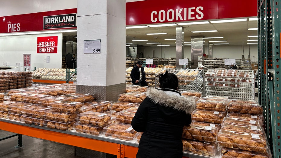 Costco bakery with woman shopping