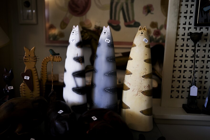 A cat-themed estate sale celebrates all things cats, such as china, figurines and dolls.