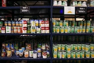 Miscellaneous canned items stock the shelves during Brother Bill's Helping Hand grocery...