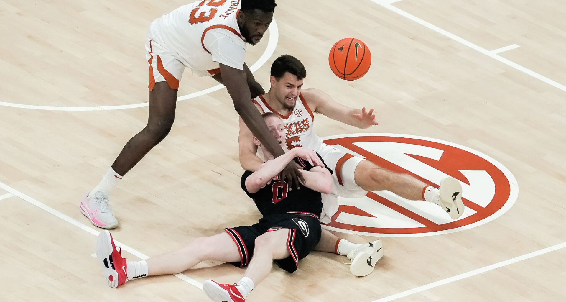 People protest ICE outside Austin City Hall in downtown Tuesday, Jan. 20, 2026. A petition was given to City Council asking for an ordinance to prevent the Austin Police Department from helping ICE agents serve warrants to Austin residents.