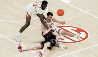 People protest ICE outside Austin City Hall in downtown Tuesday, Jan. 20, 2026. A petition was given to City Council asking for an ordinance to prevent the Austin Police Department from helping ICE agents serve warrants to Austin residents.