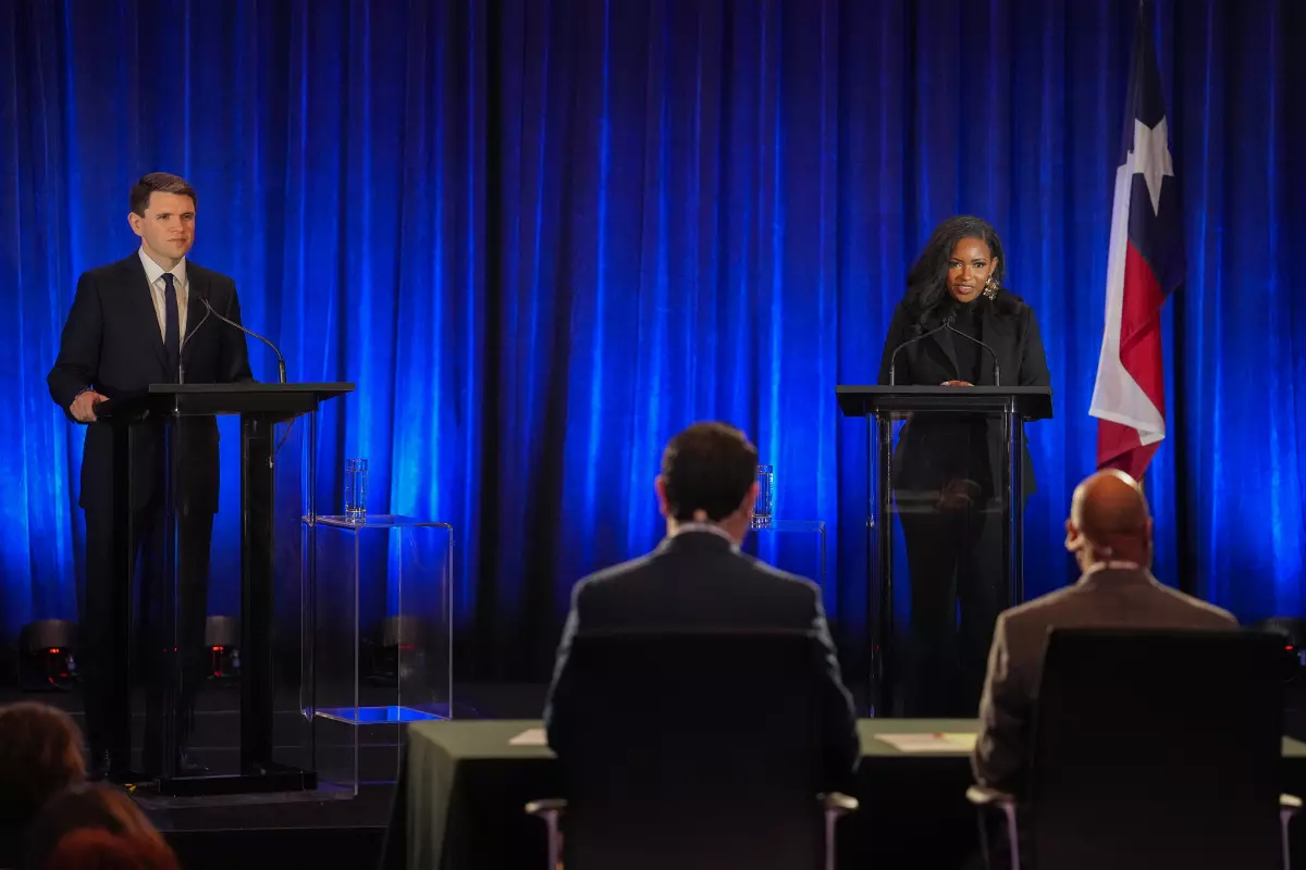 State Rep. James Talarico, left, and U.S. Rep. Jasmine Crockett, Democratic primary candidates for U.S. Senate, participate in a debate at the Texas AFL-CIO COPE Convention in Georgetown, Texas on Saturday, Jan. 24, 2026.