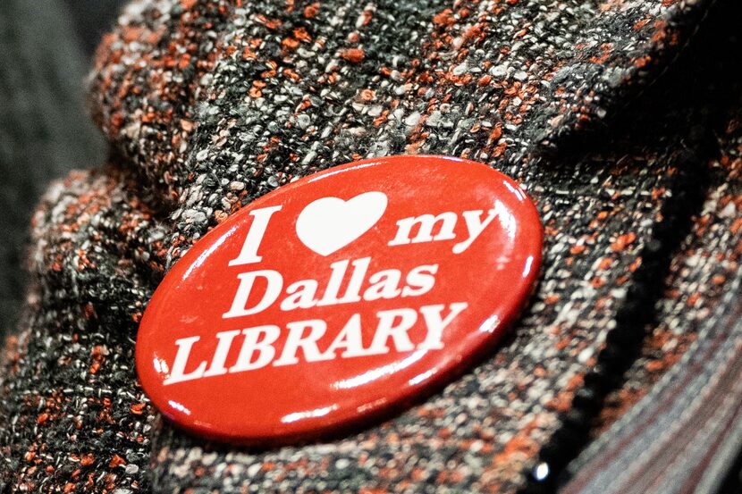 An audience member wears a button that reads, “I ♥︎ my Dallas LIBRARY”, as Dallas Public...