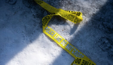 This image taken from video provided by WABI television, emergency services work on a scene of the Bombardier Challenger 600 crash at the Bangor Airport in Maine, late Sunday, Jan. 25, 2026. (WABI via AP)