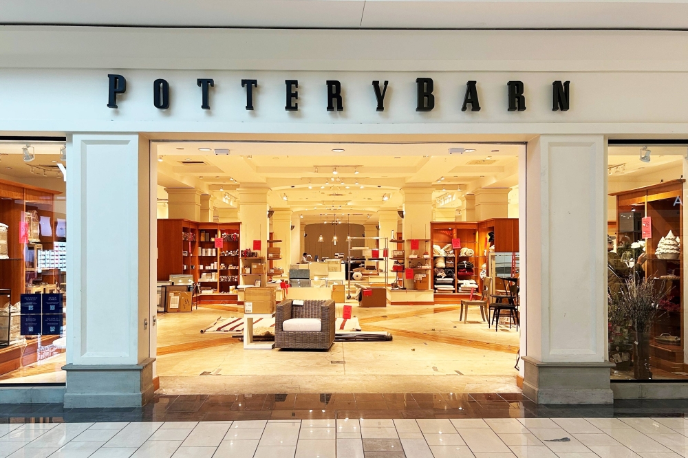 Exterior of a business in a mall featuring Pottery Barn signage.