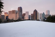 Downtown Dallas seen from Griggs Park as the sun rises during a winter storm on Monday, Jan....