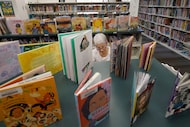 Jayne Bridges of Dallas looks for books for her grandchildren at Skillman Southwestern...