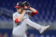 Washington Nationals' MacKenzie Gore delivers a pitch during the first inning of a baseball...