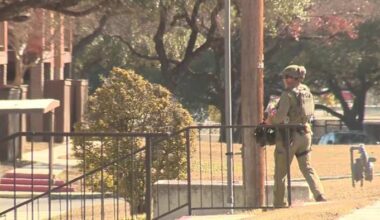 2 detained after police deploy tear gas, flash bangs on barricaded armed robbery suspects