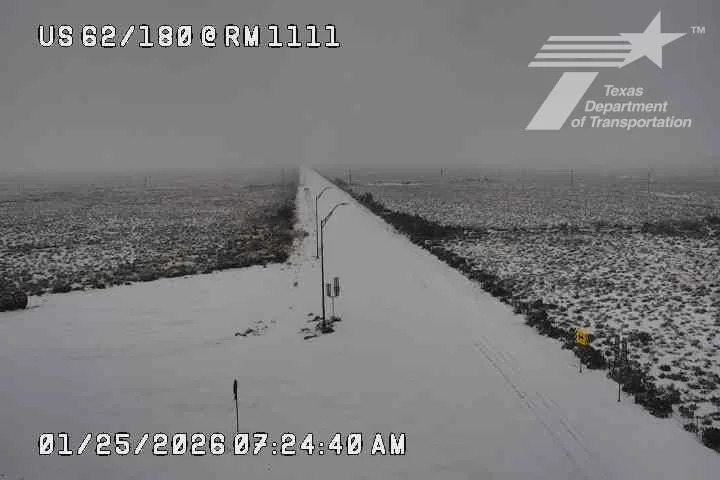 Snow covers a closed U.S. Highway 62/180 in Hudspeth County, Texas, between El Paso and the Guadalupe Mountains National Park, on Sunday morning, Jan. 25, 2026, as a winter storm hit Texas.