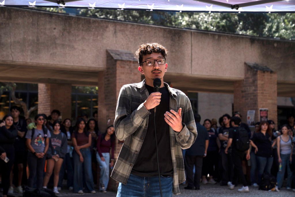 Luis Valdez, who voted for President Trump, speaks with former U.S. Rep. Mayra Flores, R-Texas, at The University of Texas Rio Grande Valley in Edinburg, Texas on October 28, 2025. Gabriel V. Cárdenas for The Texas Tribune