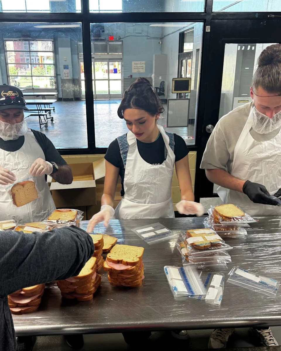 The images, which were snapped on Dec. 29, featured Chávez in full volunteer gear - complete with gloves, a hair net and an apron. (Courtesy of the San Antonio Food Bank)