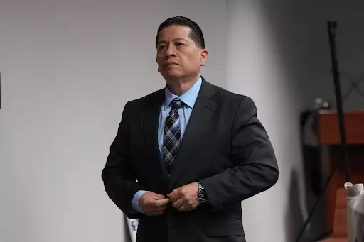 Former Uvalde school district police officer Adrian Gonzales leaves the courtroom during a break at the Nueces County Courthouse in Corpus Christi, Texas, Tuesday, Jan. 6, 2026.