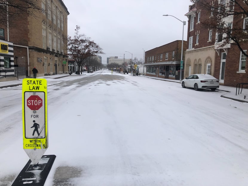 Magnolia Avenue, usually a lively strip of restaurants and shops in Fort Worth, was quiet...