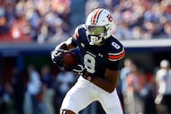 Auburn wide receiver Cam Coleman carries the ball after a reception against Louisiana-Monroe...