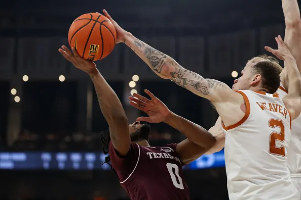 AUSTIN, TX – JANUARY 17: Guard Chendall Weaver #2 of the Texas Longhorns blocks a shot attempt by Guard Marcus Hill #0 of the Texas A&M Aggies during the SEC college basketball game between Texas Longhorns and Texas A&M Aggies on January 17, 2026, at Moody Center in Austin, TX. (Photo by David Buono/Icon Sportswire via Getty Images)
