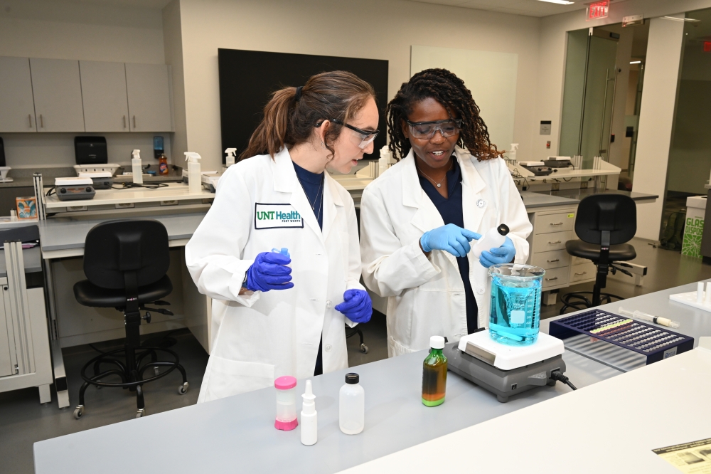 Two students in a lab