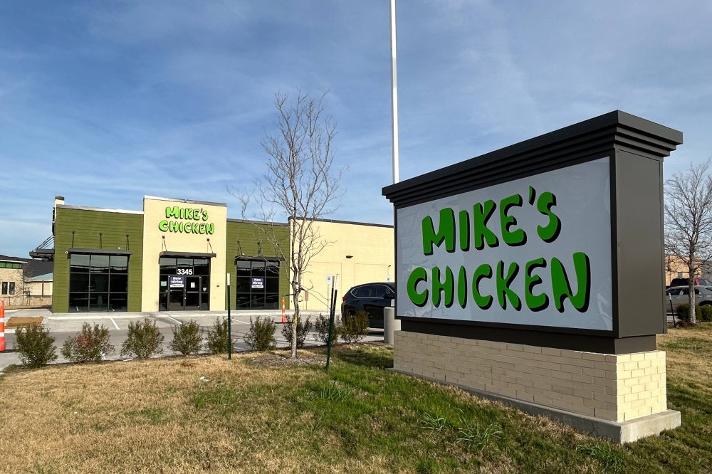 Exterior of a freestanding business with Mike's Chicken signage.