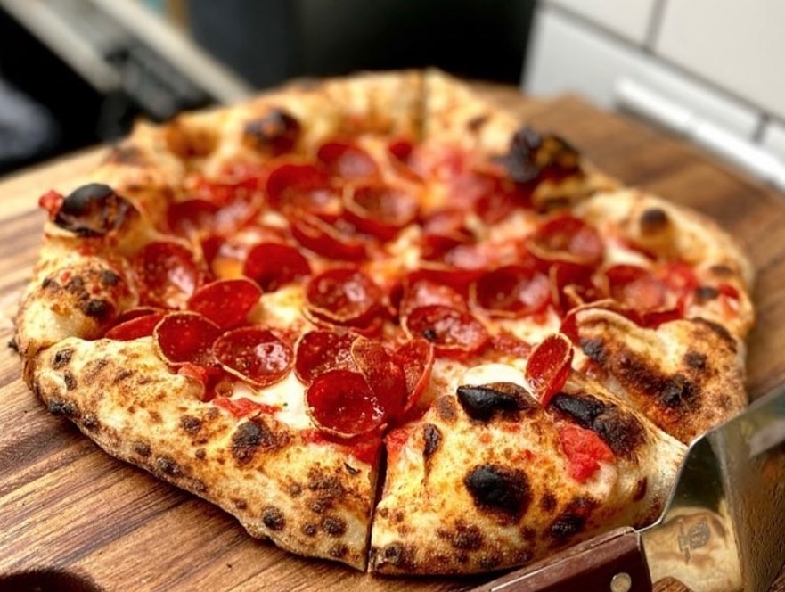 An image of pizza served at the business.