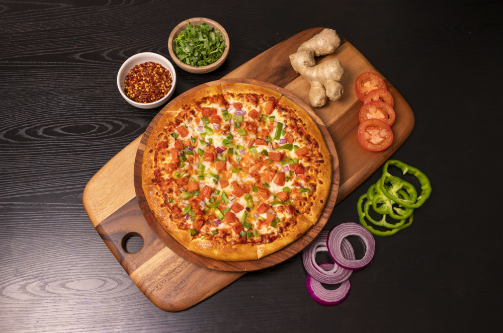 Butter chicken pizza