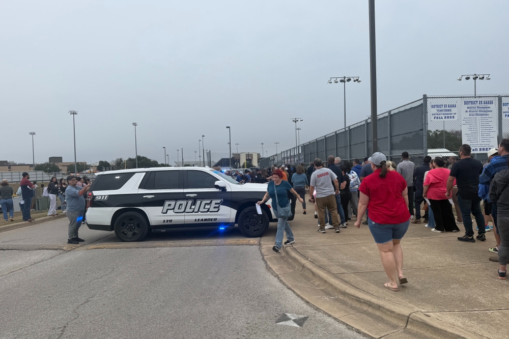 Leander ISD police car and parents after January 9 lockdown