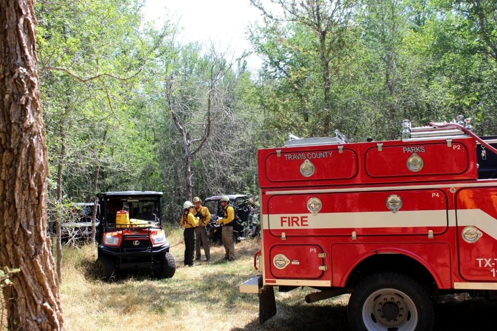 A prescribed burn led by Travis County fire crews earlier this year helped lessen wildfire danger in eastern Travis County. (Haley McLeod/Community Impact)