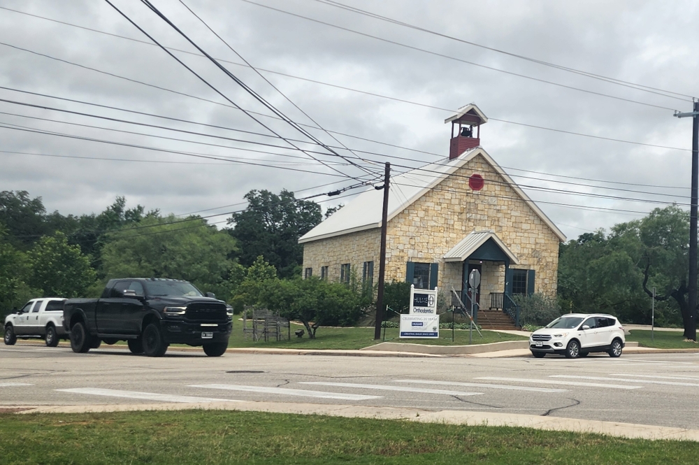 The intersection of School Street and Johns Road is planned to have a roundabout constructed. (Jarrett Whitener/Community Impact)