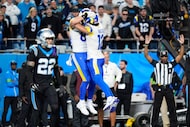 Los Angeles Rams tight end Colby Parkinson, center left, celebrates his touchdown catch with...