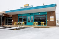 Snow and ice covers the parking lot of Lubbies Bagels in East Dallas, Tuesday, Jan. 27, 2026. 