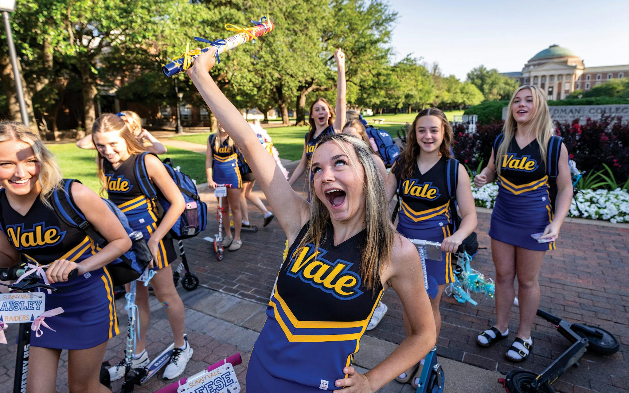 May 31 8:15 A.M. Reese Garver, from Sunnyvale High School, showing off the spirit stick her team won during a cheer camp, at Southern Methodist University.