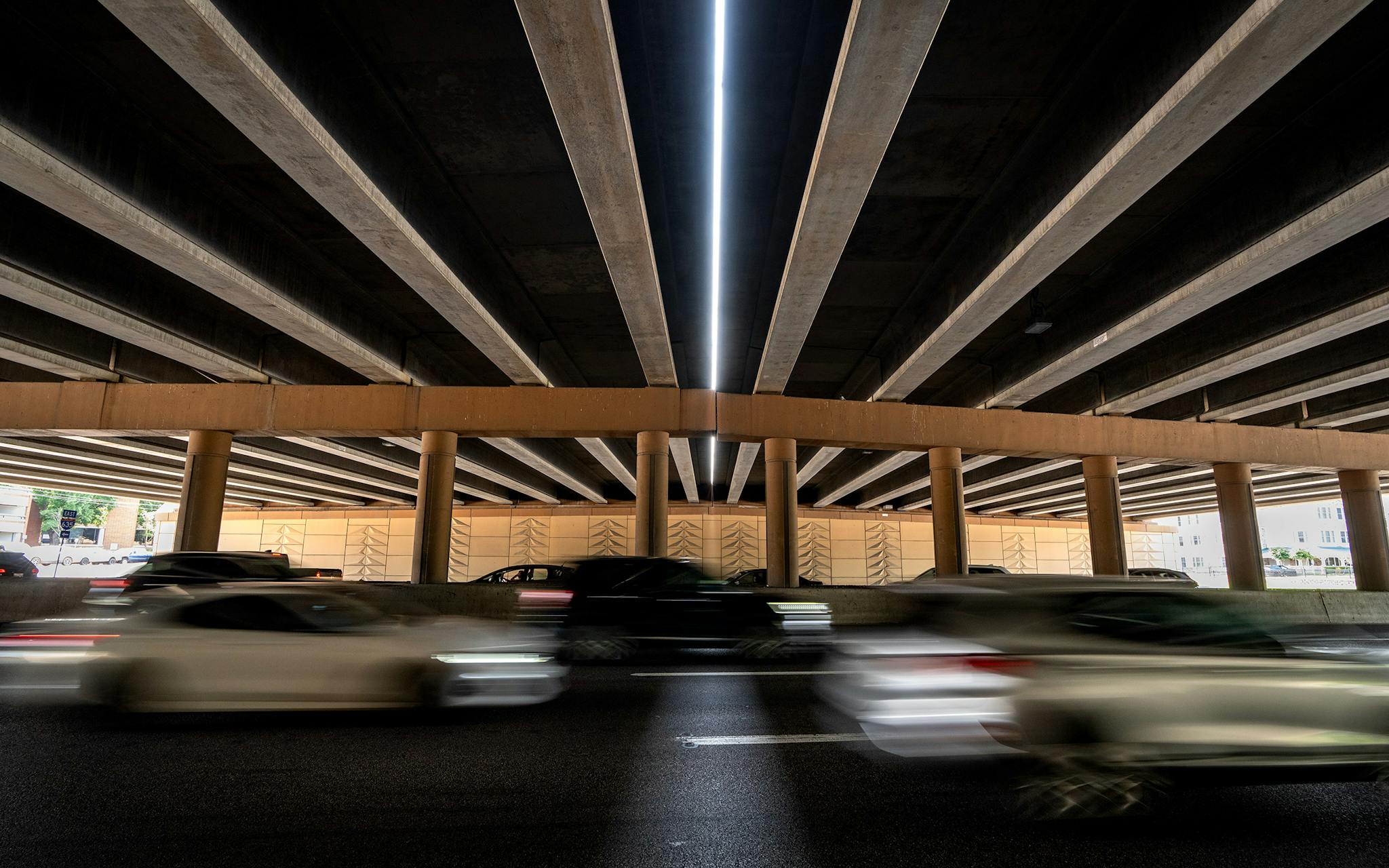 May 31 4:22 P.M. Traffic on Hillcrest Road passes beneath Lyndon B. Johnson Freeway.